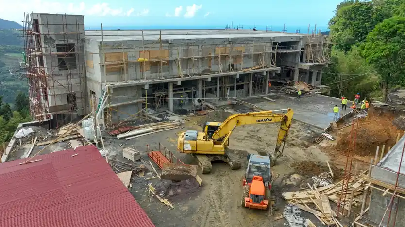 Excavator working alongside the Bottom station shell